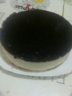 Una foto de Tarta de queso con mermelada de arándanos