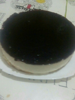 Una foto de Tarta de queso con mermelada de arándanos