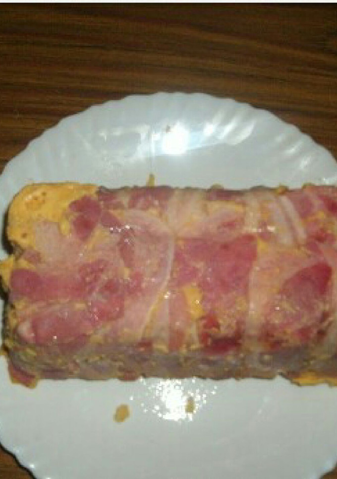 Una foto de pastel de patatas con beicon jamon york y queso 