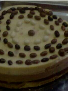 Una foto de Tarta de tres chocolate