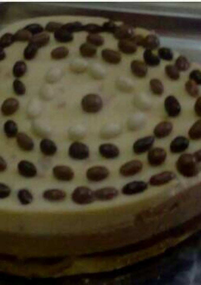 Una foto de Tarta de tres chocolate