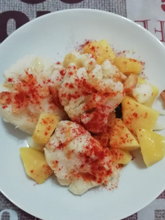 Una foto de Coliflor con pimentón