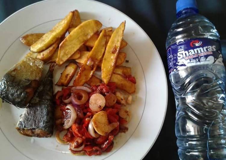 Fried yam with grilled Titus fish