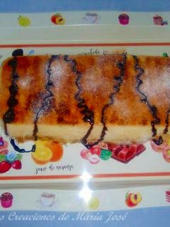 Una foto de Pastel de cuajada con barquillos