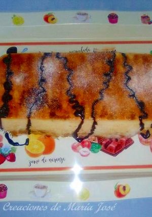 Una foto de Pastel de cuajada con barquillos
