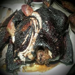 A picture of pecan smoked turkey .