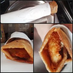 Egg chicken paratha roll A picture of Egg chicken paratha roll.