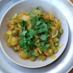 A picture of Cabbage and peas vegetable.