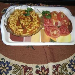 A picture of Tomato sev sabzi.