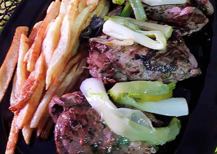 Filetes de ternera aliñados con cebolletas tiernas aliñadas