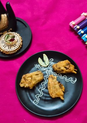 A picture of Pumpkin flowers stuffed egg masala.