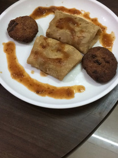 A picture of Left over pulao and roti pockets.
