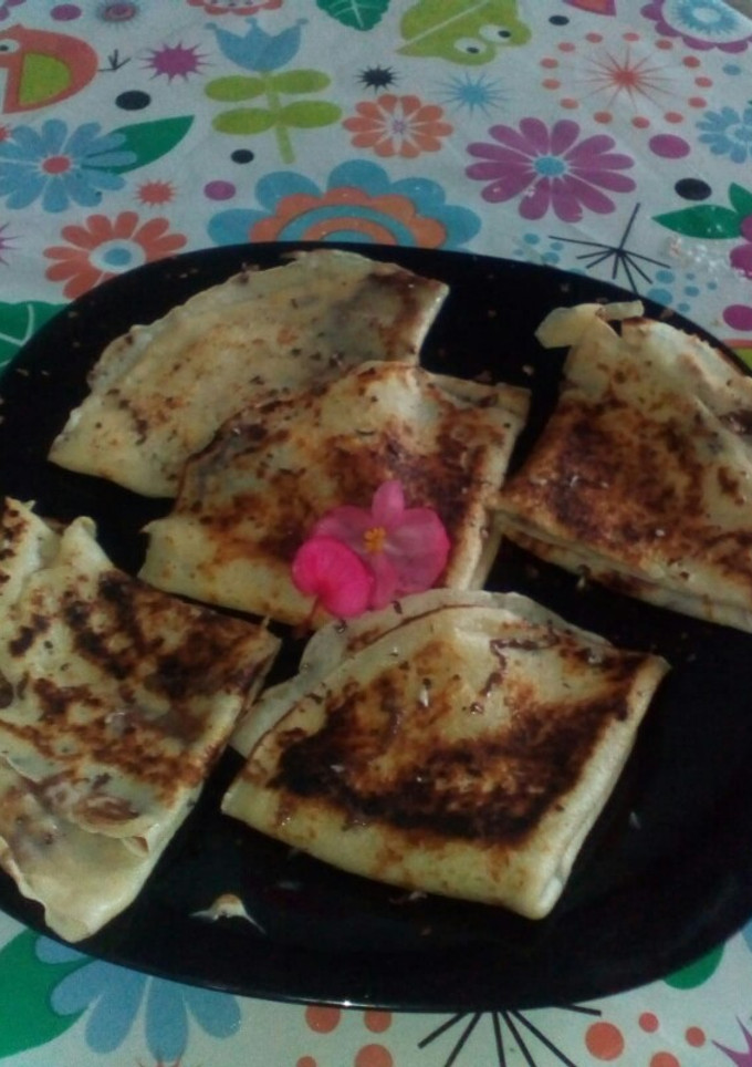 Una foto de Creps de la tata María rellenos de turrón 3 chocolates