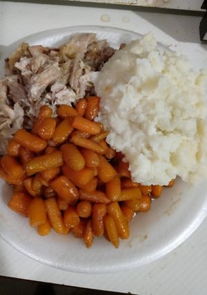 A picture of Slow Cooked Pork Roast with Ranch Mashed Potatoes and Glazed Carrots.