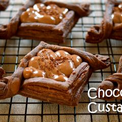 A picture of Chocolate Custard Cream Pie / Cocoa Puff Pastry Dough.
