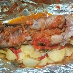 Grilled fish with potatoes and vegetables A picture of Grilled fish with potatoes and vegetables.