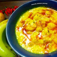A picture of Raw banana and potato curry.