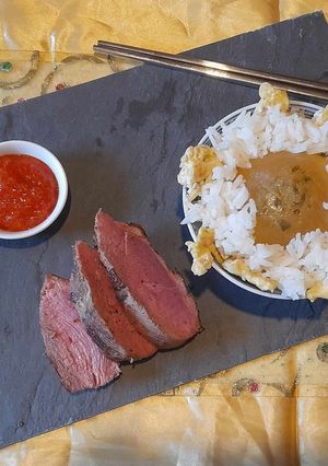 Une photo de Riz aux œufs et magret de canard