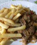 Carne asiento salteada con papas al horno