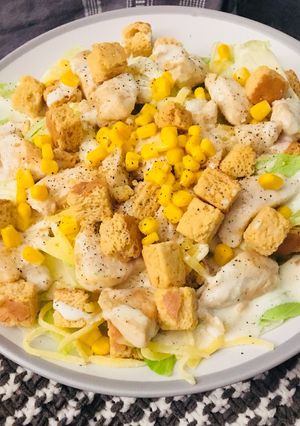 A picture of Chicken cesar salad.