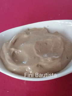 Una foto de Alioli de leche con ajo negro