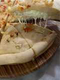 Fugazza rellena con Masa Saborizada