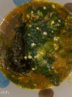 A picture of Okro soup with smoked fish.
