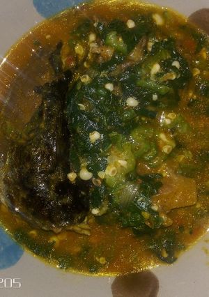 A picture of Okro soup with smoked fish.