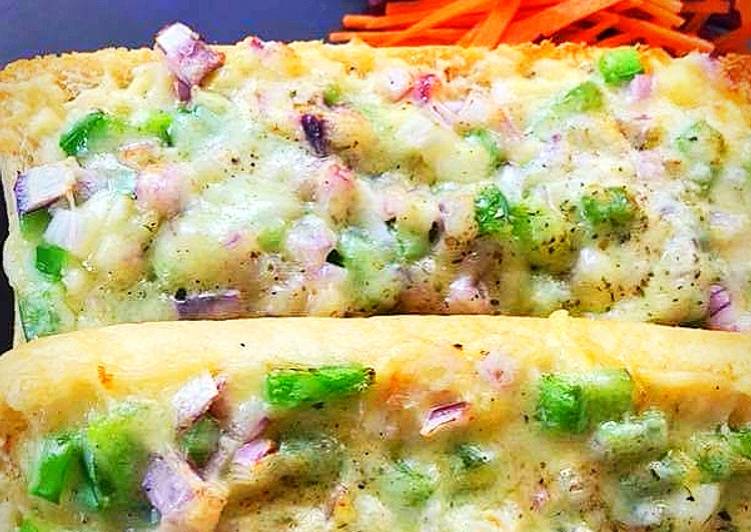 Step-by-Step Guide to Prepare Quick Veggies loaded cheesy garlic bread