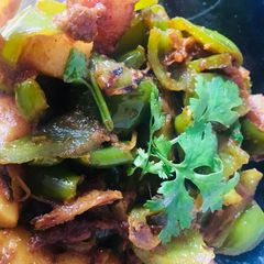 A picture of Potatoes capsicum stir fry.