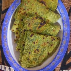 A picture of Palak paratha/ spinach paratha.