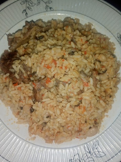 A picture of Jollof Rice and Beans.