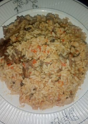A picture of Jollof Rice and Beans.