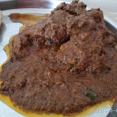 A picture of Chettinad chicken.
