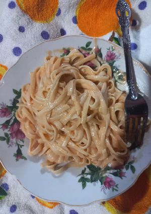 Una foto de Spaghetti de tomate y queso crema
