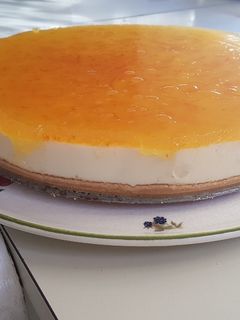 Una foto de Tarta queso - cuajada de naranja amarga. Sin horno