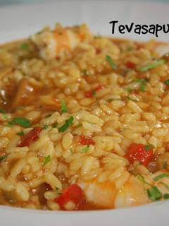 Una foto de Arroz meloso de sepia y langostinos
