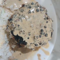 A picture of Hamburger Steak with Whisky Peppercorn Sauce.
