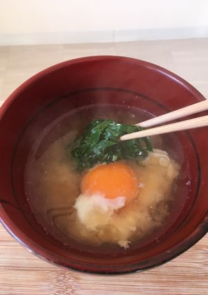 A picture of Miso soup with kale.