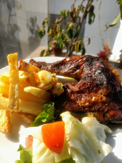 Una foto de Pollo a la brasa de mi casa