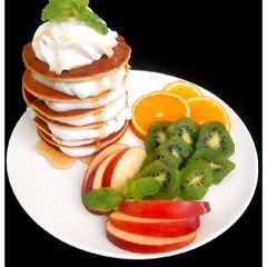 A picture of Pancake with Fruits and Cream.