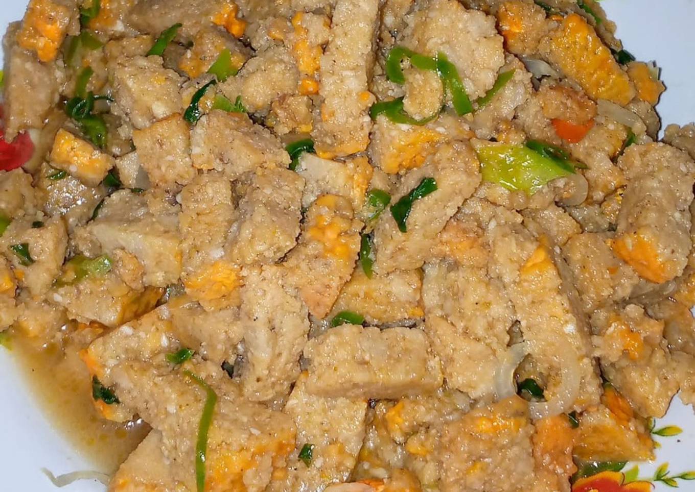Tumis oncom pedas daun kencur