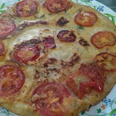 A picture of Tomato Uttapam (king size).