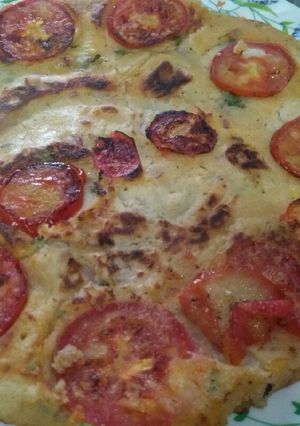 A picture of Tomato Uttapam (king size).