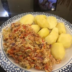 A picture of Boiled Irish potatoes and scrambled eggs.