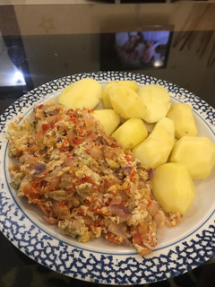 A picture of Boiled Irish potatoes and scrambled eggs.