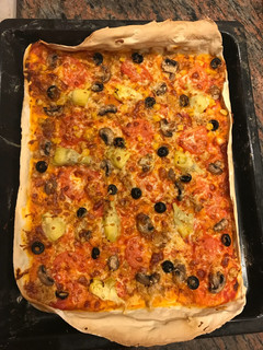 Una foto de Pizza atún