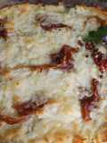 Pastel de carne de ternera y salchichas frescas con coliflor y mozzarella