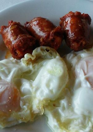 Una foto de Huevos fritos con chorizo colorado 