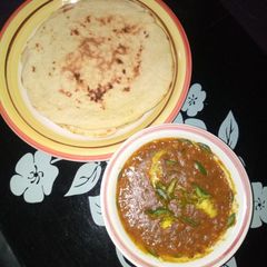Indian roti with potatoes soup A picture of Indian roti with potatoes soup.